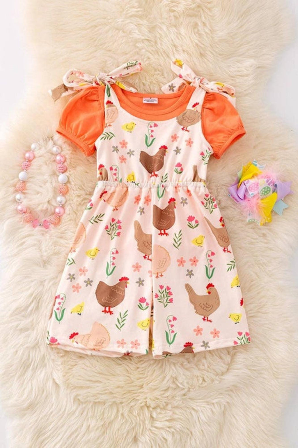 Hen printed girls romper.