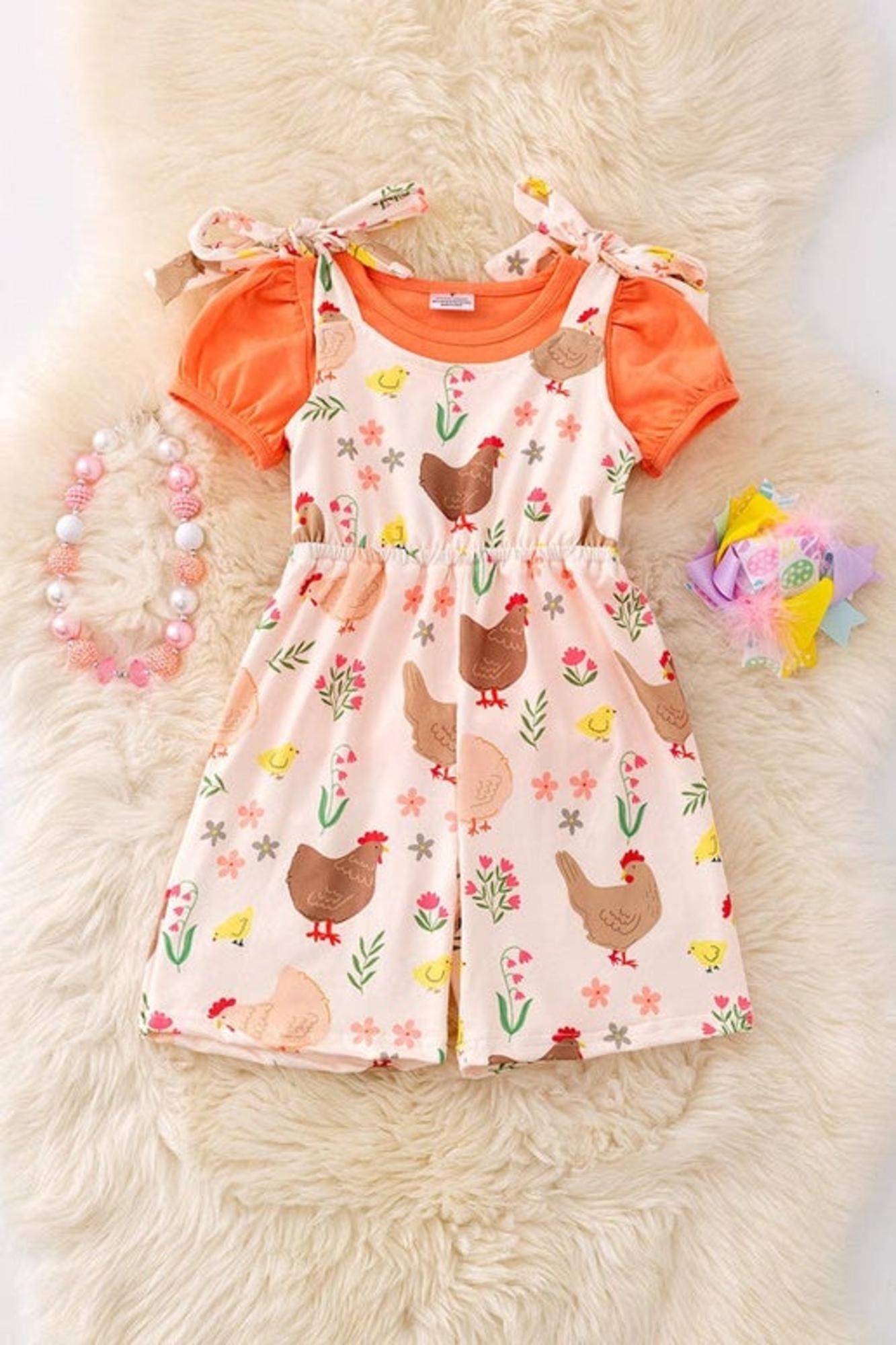Hen printed girls romper.