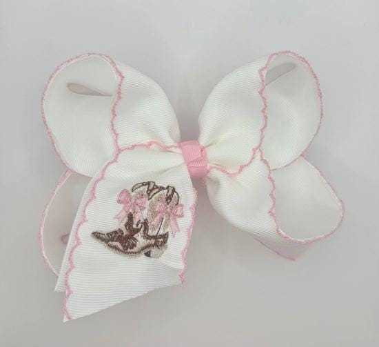 Western boot embroidered hair bow with  moon stitch.