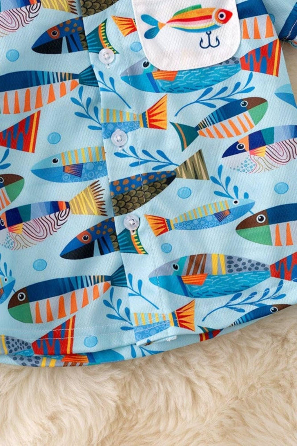 Button up fish printed shirt with collar.