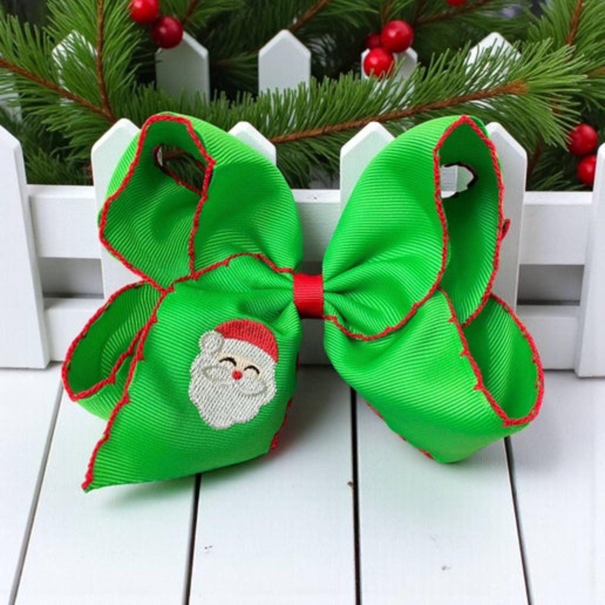 5" Green Santa embroidered and moon stitch trim.