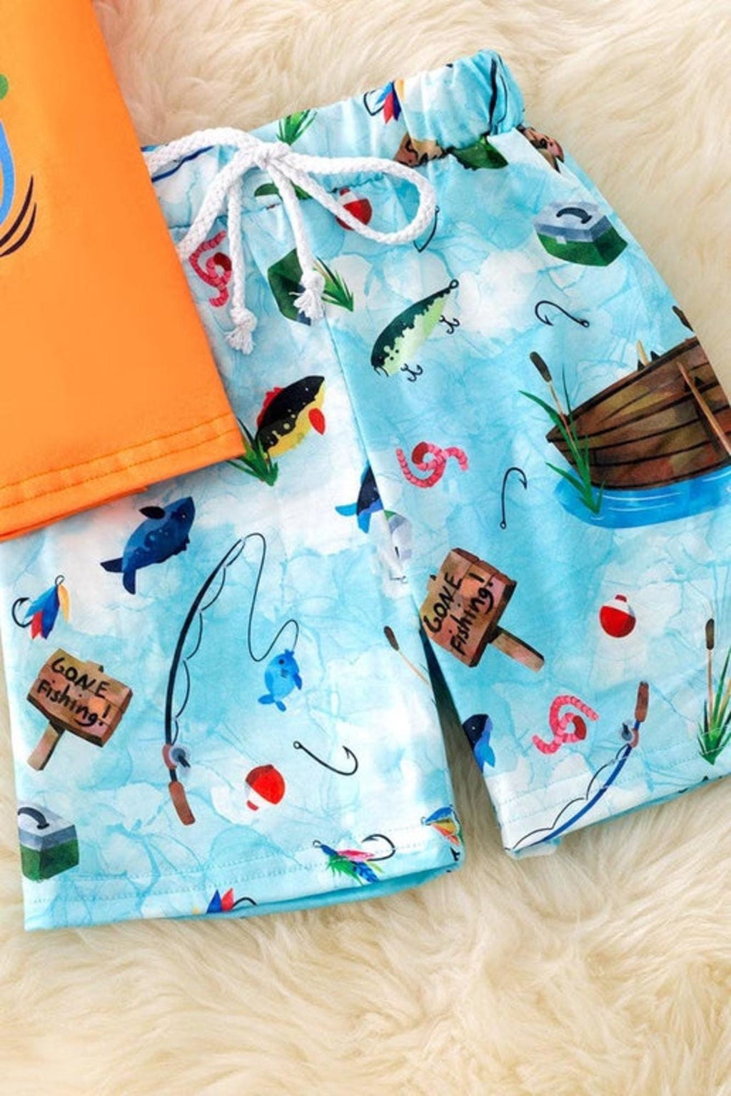 Daddy's Fishing buddy" Orange tee & fish printed shorts.