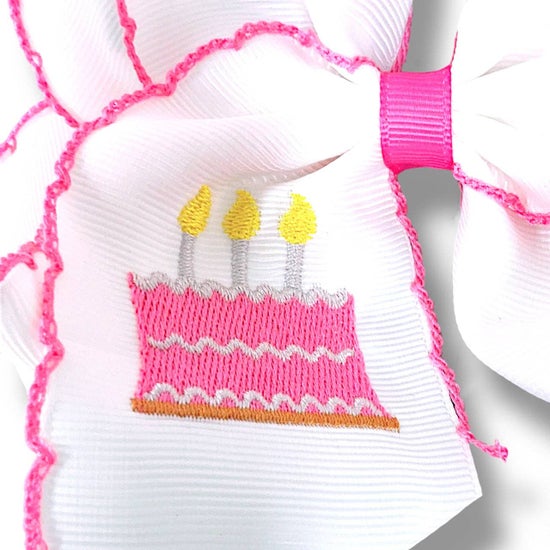 5" Birthday cake embroidered hair bow with moon stitch trim