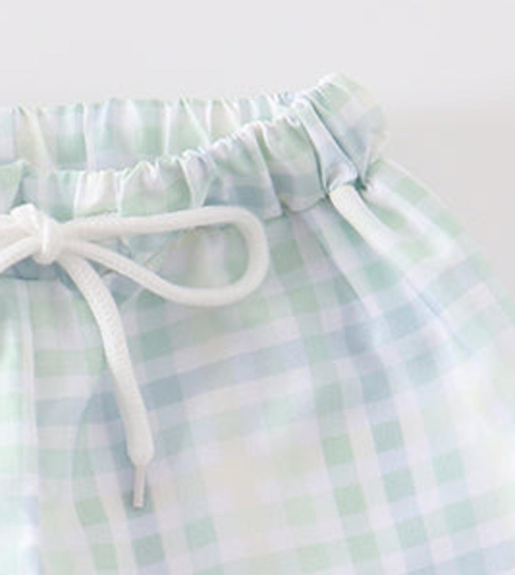 Green plaid boy trunk shorts