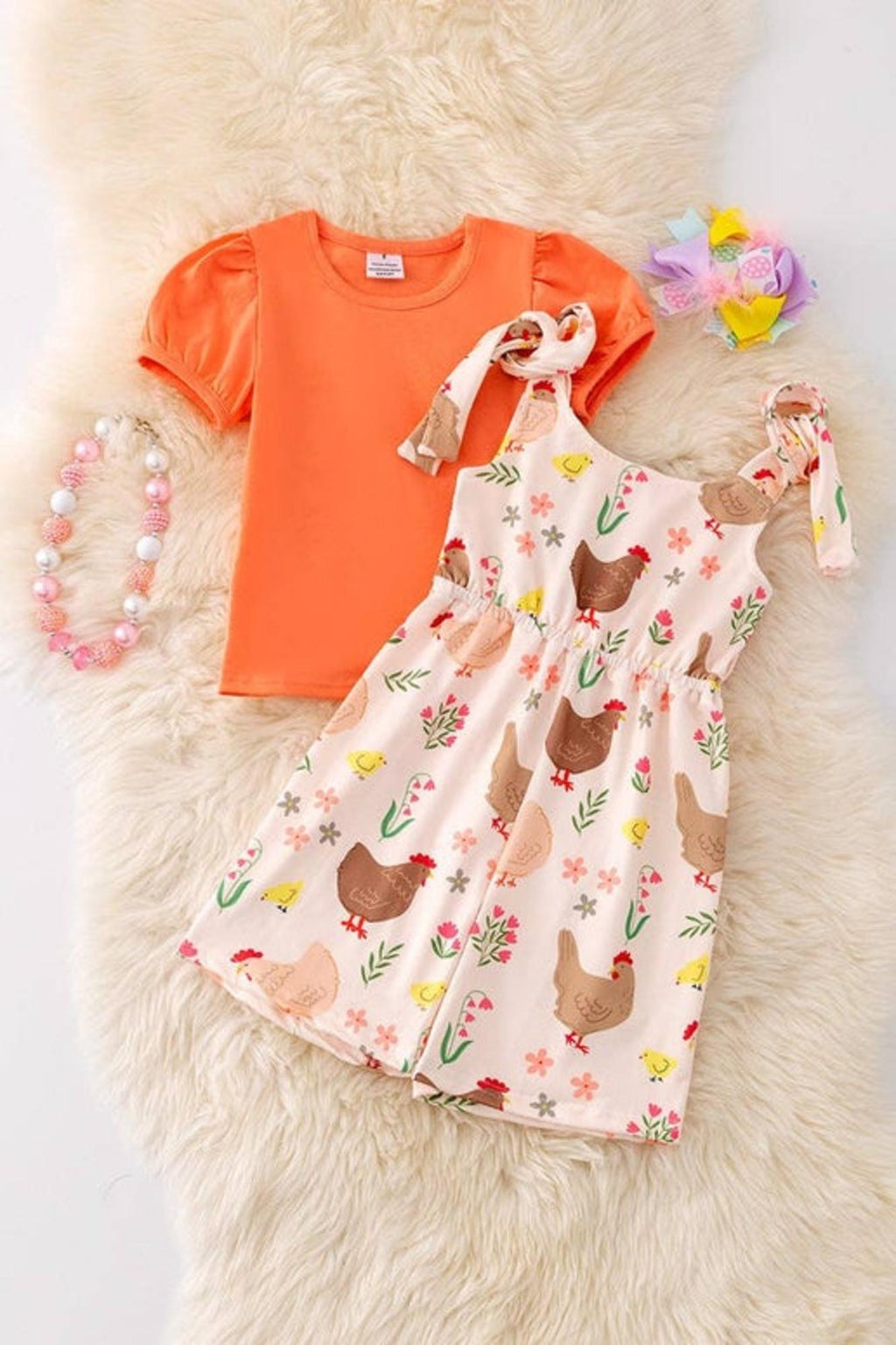 Hen printed girls romper.