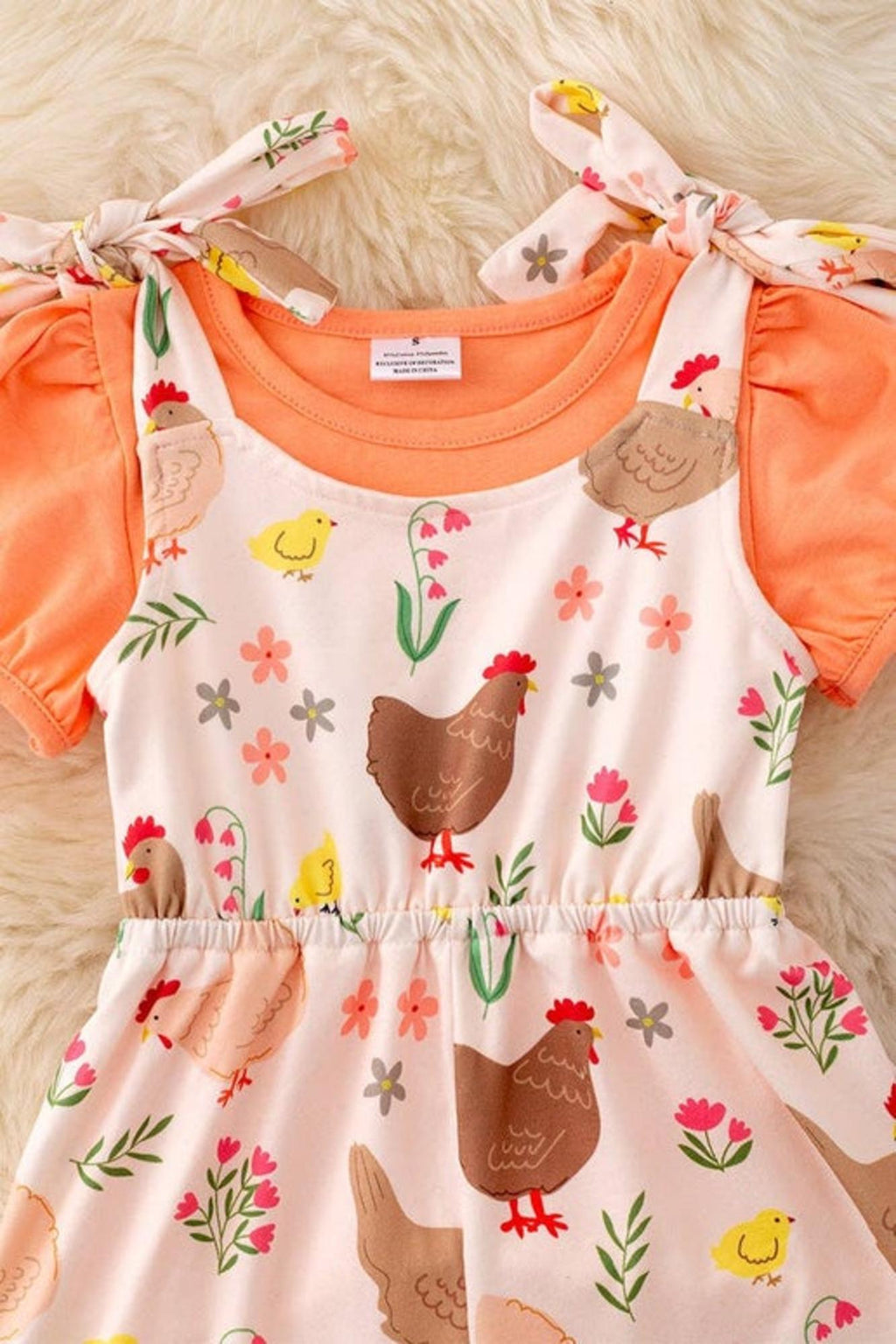 Hen printed girls romper.