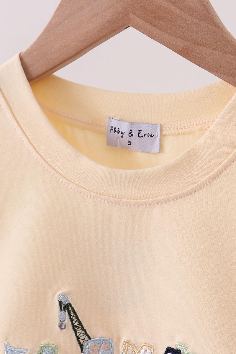 Beige construction embroidery top